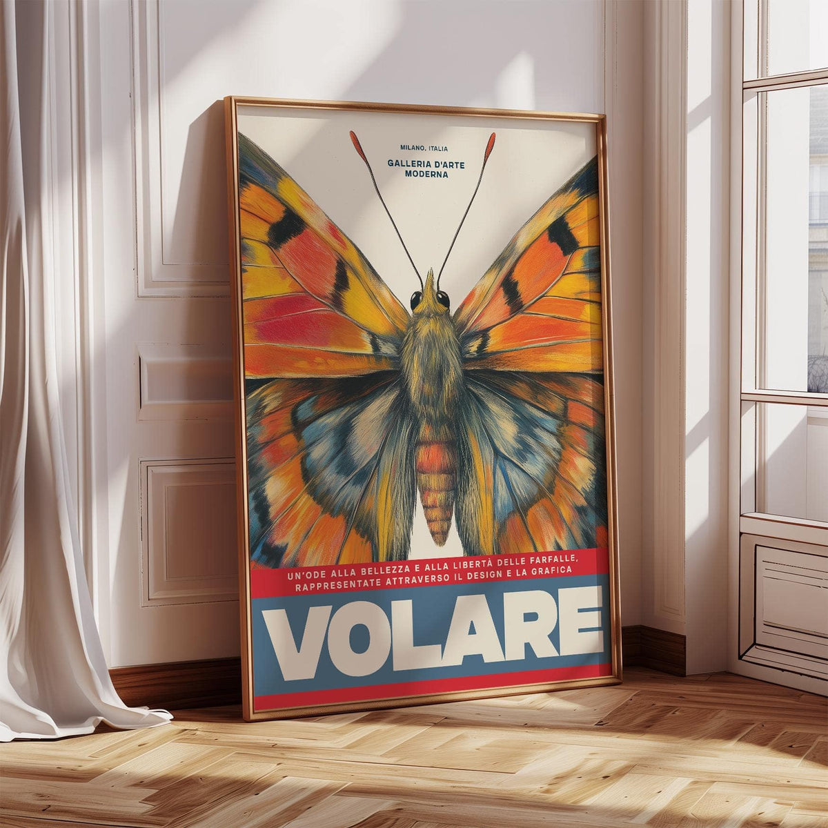 Butterfly Art Wall print of butterfly wings in orange and blue leaning on wooden floor near white door with curtain
