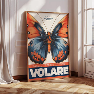 Print leaning on a floor showing a blue and orange butterfly with bold text and sunlight from large window