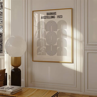 Bauhaus Minimalism Art print with black line arches in a wooden frame in an elegant room with moulded walls and floor lamp