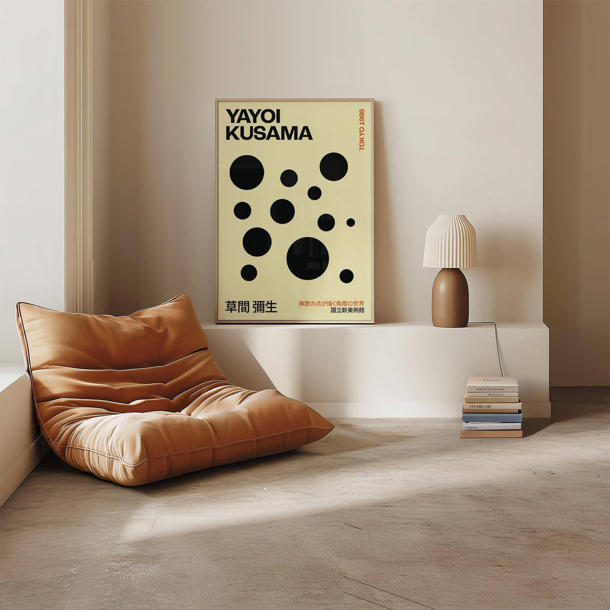 Polka Dot Artwork print leaning on a shelf with minimalist black dots and text with a lamp nearby