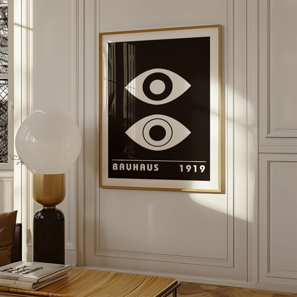 Eye Art framed print close-up of black and white abstract eyes with bauhaus text beside a lamp in a room