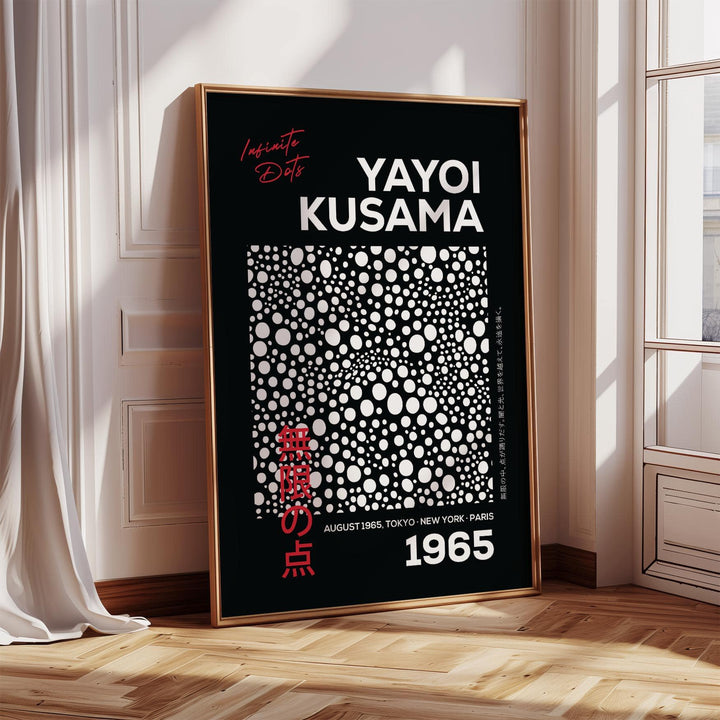Wall Art Polka Dots leaning print with bold white dots on black and red text near a window