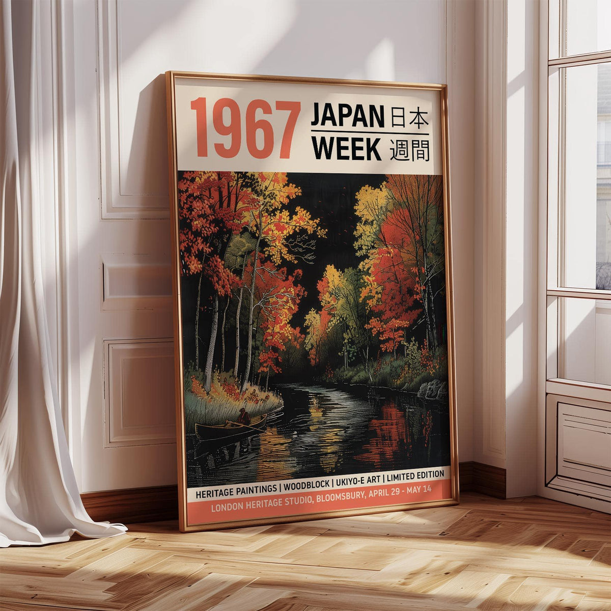 Japanese woodblock artwork leaning on floor with autumn river scene in red yellow and black colours near window