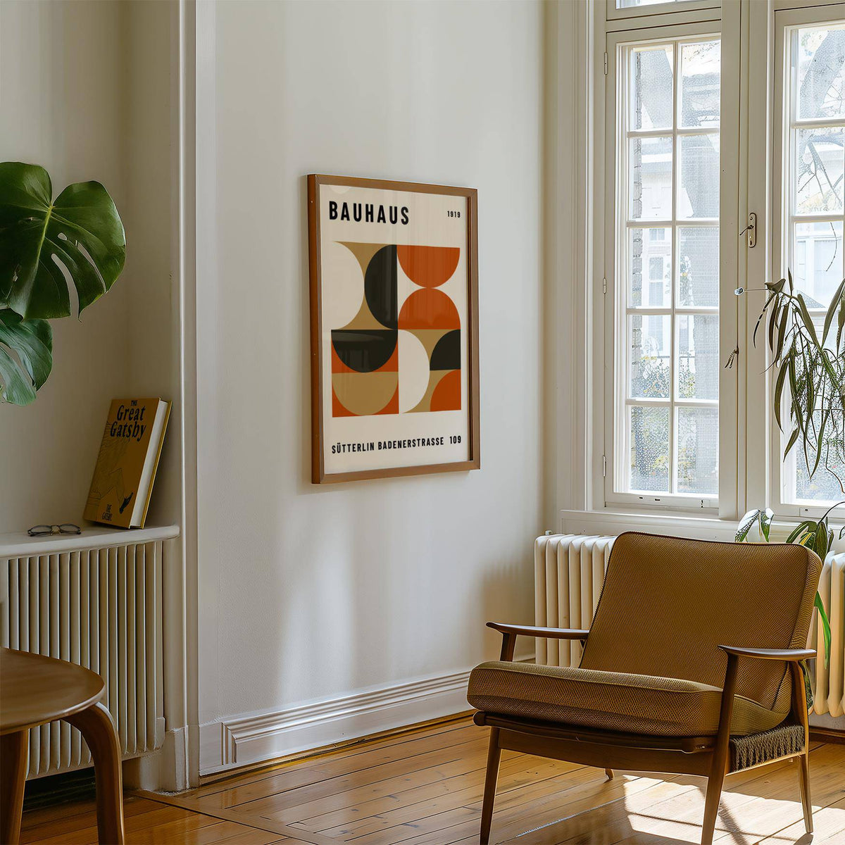 Office wall decor in Bauhaus style with geometric shapes and earthy colours in a room with a brown armchair