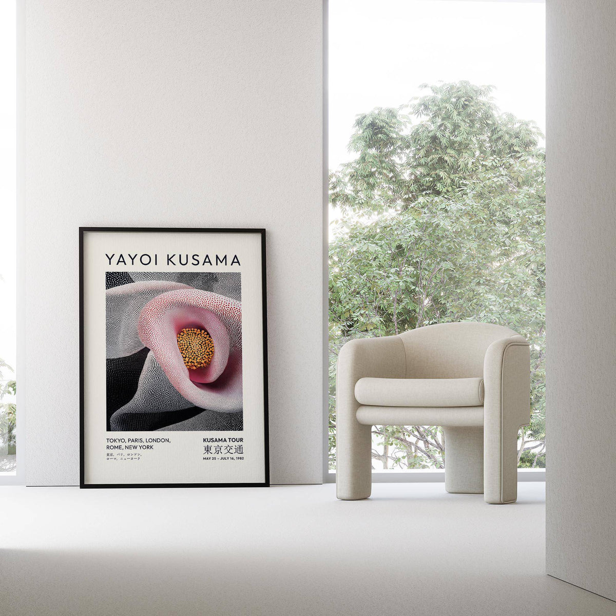 Pink Abstract Artwork print leaning on a wall beside a cream upholstered armchair near a large window
