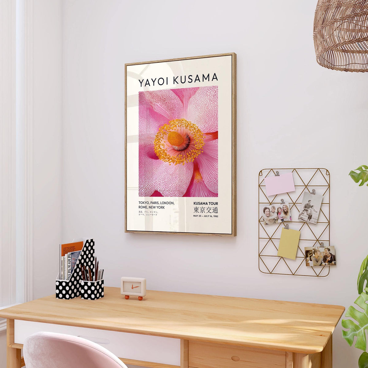 Abstract Pink Wall Art framed print with pink blossom and yellow centre above wooden desk with chair