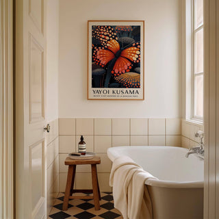 Poster Butterfly wall art of an orange butterfly with dotted patterns in a bathroom above a stool
