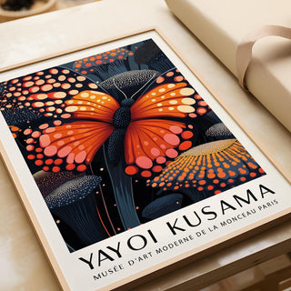 Framed Poster Butterfly showing an orange butterfly with dotted flowers lying on a surface