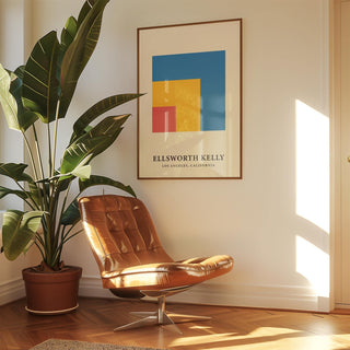 Modern Minimal Wall Art with colourful nested squares in an airy room with leather chair and large plant