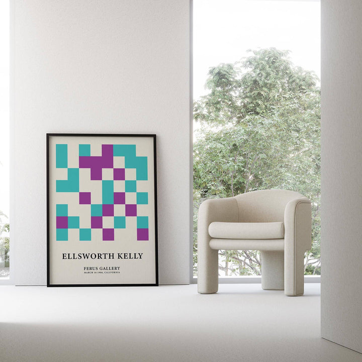 Ellsworth Kelly Pictures print leaning on floor with turquoise and purple squares and a cream armchair