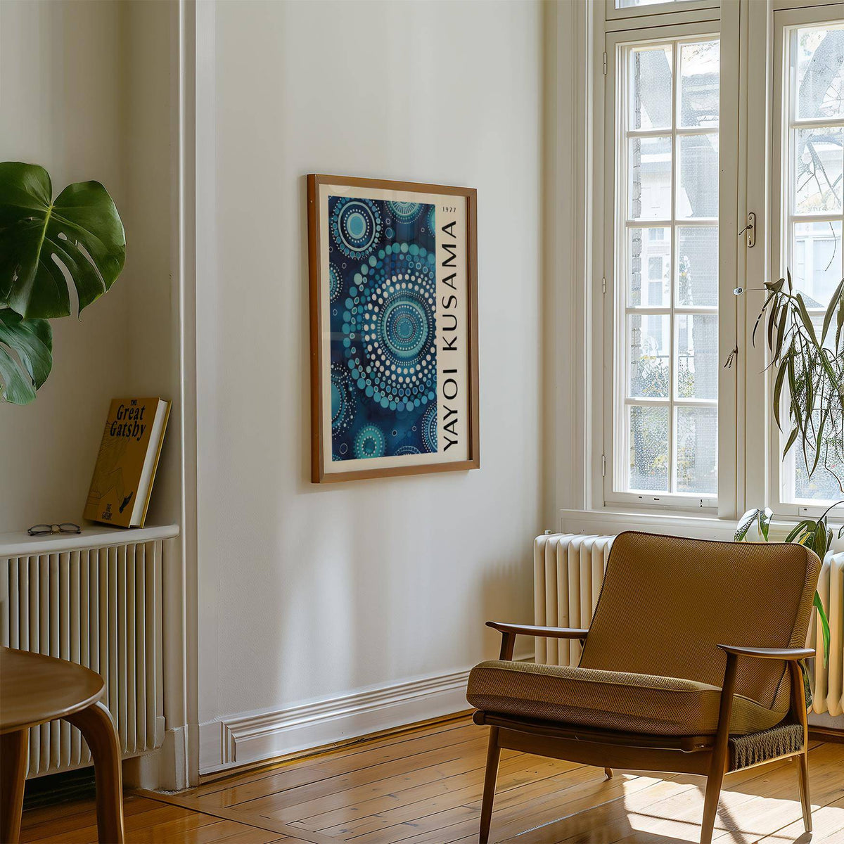 Mandala wall art with blue circular dot pattern framed on a cream wall in a softly lit sitting room