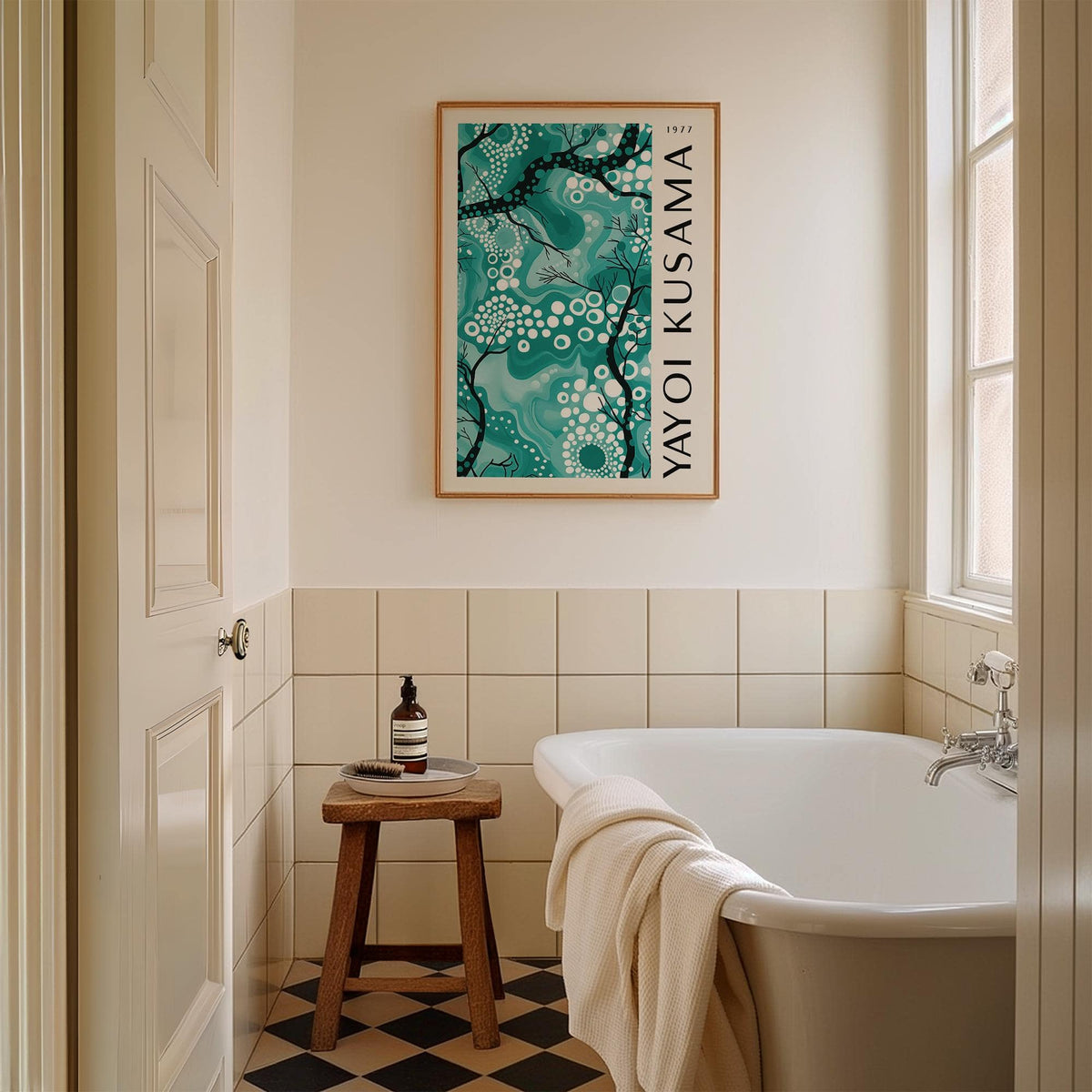 Teal wall decor of abstract branches with dots above a wooden stool in a bathroom