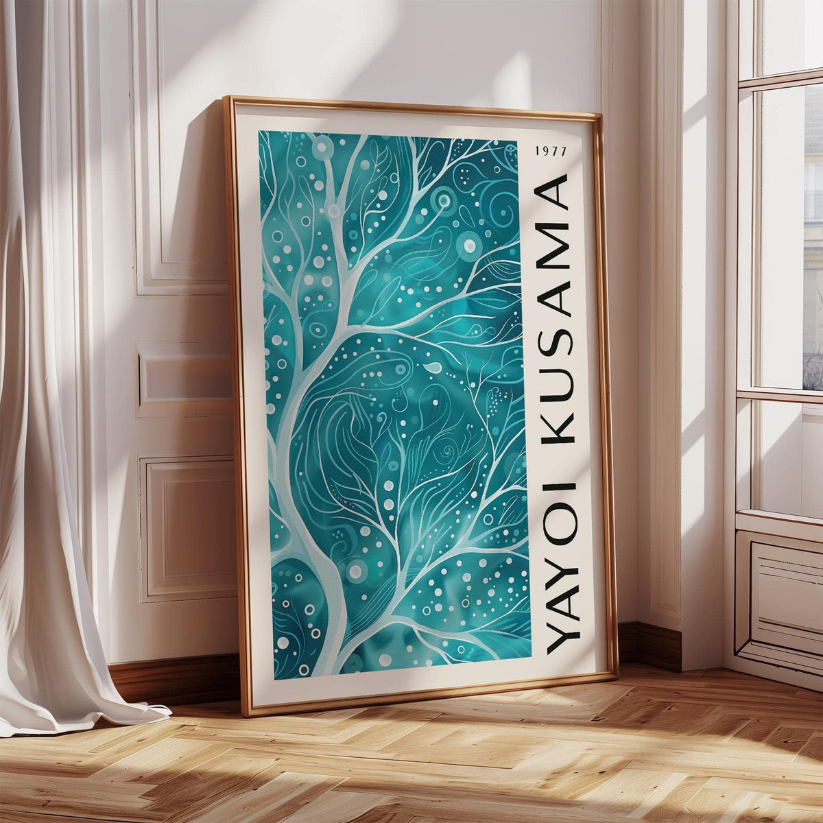 Framed Teal Color Wall Art with abstract teal branches leaning against a wall by a white curtain