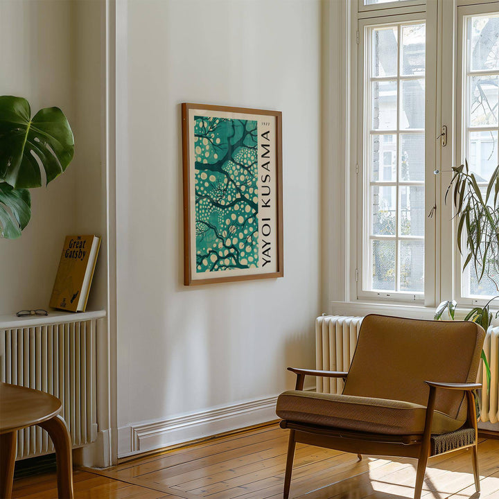 Teal wall art for living room showing abstract tree branches with dots in a light room with wooden floor
