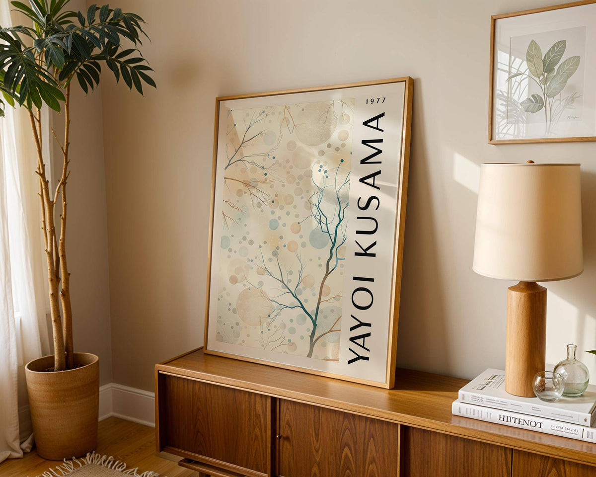 Nature Prints leaning print of abstract tree branches with circles on a wooden cabinet