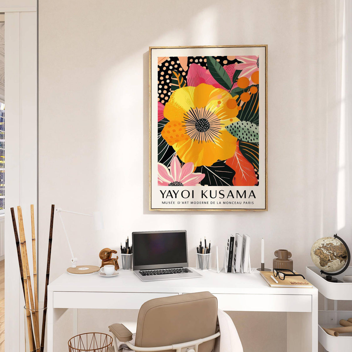 Floral wall prints framed print of a large yellow flower with pink and green leaves above a desk in a home office