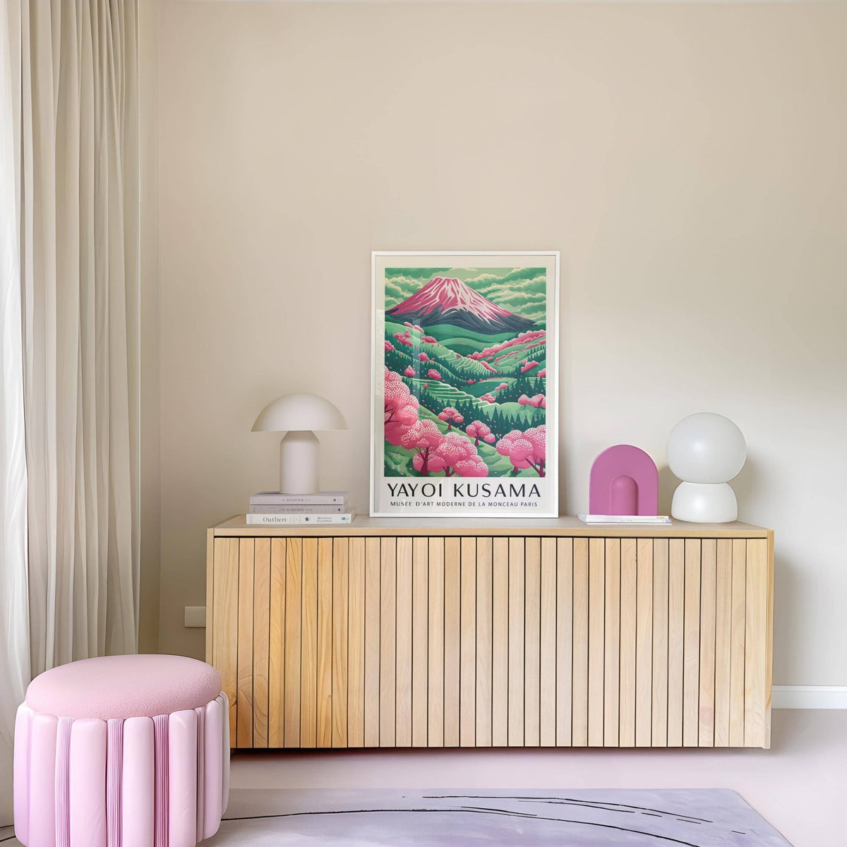 Mountain Landscape print with pink cherry blossom trees on wooden sideboard with pastel decor