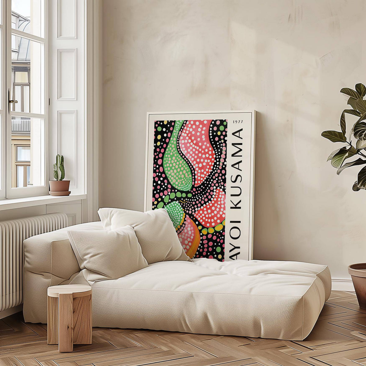 Abstract shapes wall art print with colourful dotted pattern leaning by a beige sofa and wooden side table