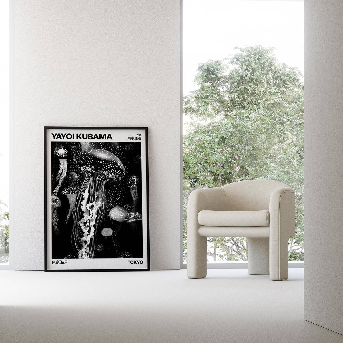 Jellyfish Art print leaning on floor with black frame near an armchair beside a large window