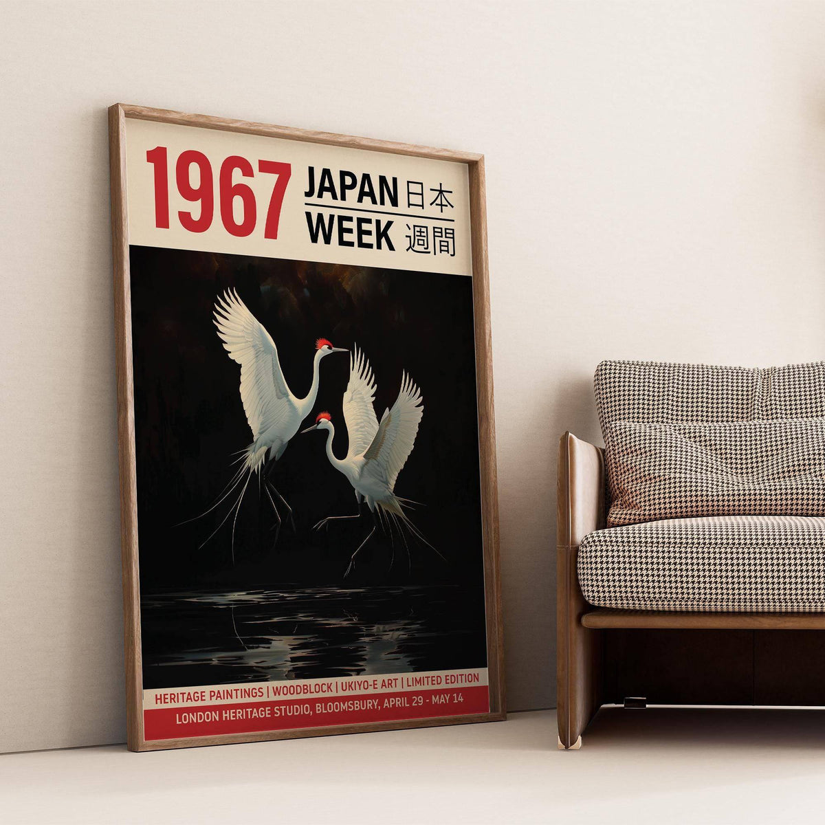 Crane Art Print leaning against wall beside a checked sofa in a neutral room