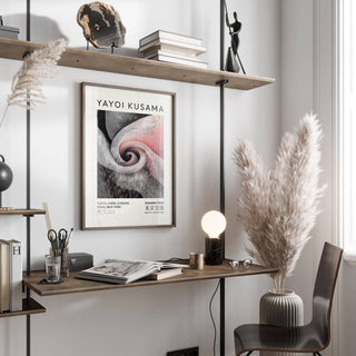 Luxury Wall Art for Living Room featuring a spiral dot pattern in black white and soft pink above a desk with an open book