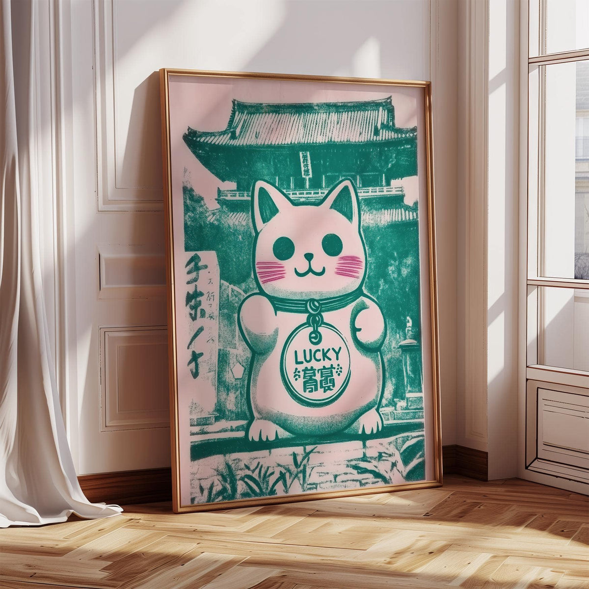 Print leaning on floor of monochrome charm II maneki-neko cat with green and pink tones by a window