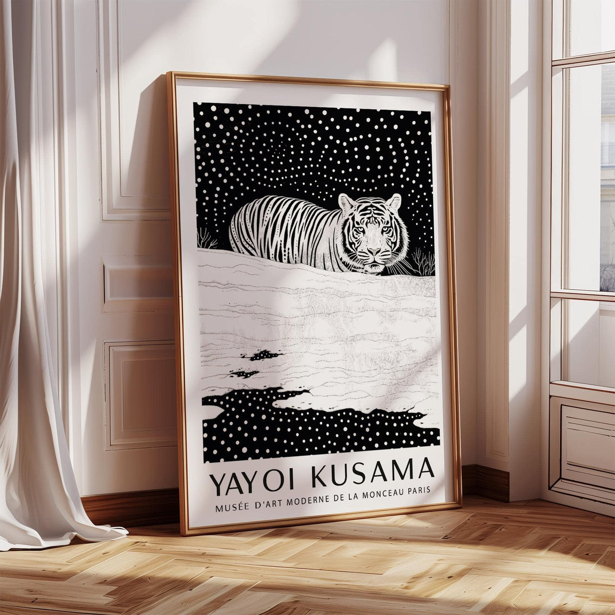 Print leaning on floor of minimalist white tiger in black and white with patterned background next to window