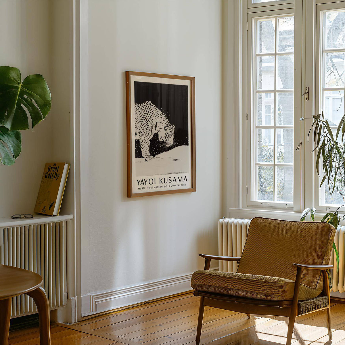 White Tiger wall art in black and white minimalist style hanging above radiator near an armchair