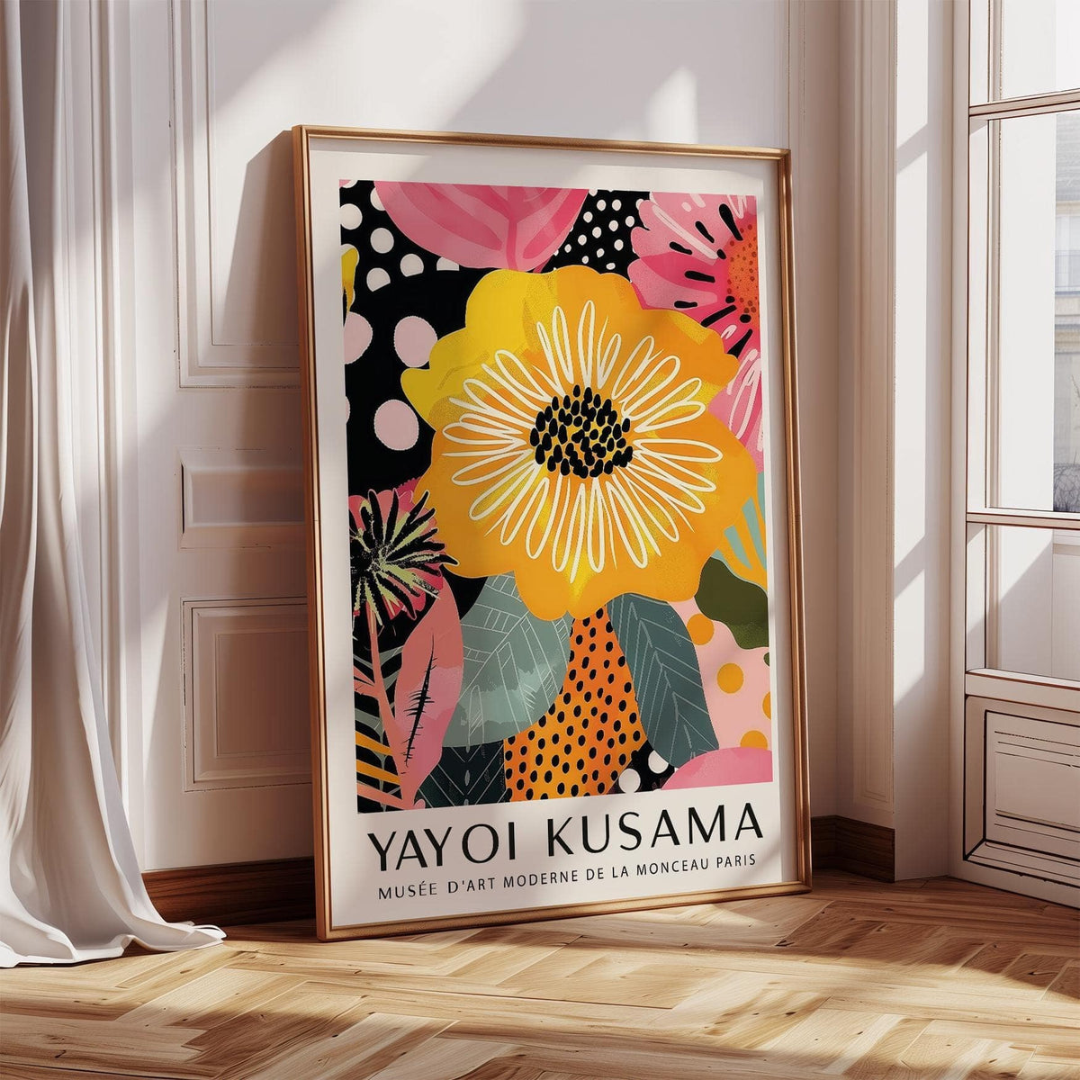 Abstract art of flowers print leaning on floor with light wooden frame and sunlight in a room
