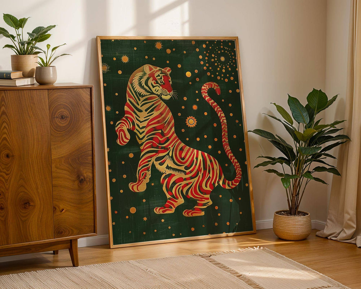 Print of stylised tiger in red and yellow on dark green leaning on floor next to two plants