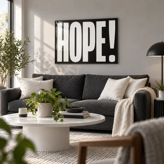 Inspirational Artwork, framed on the wall of a modern living room with a light grey wall