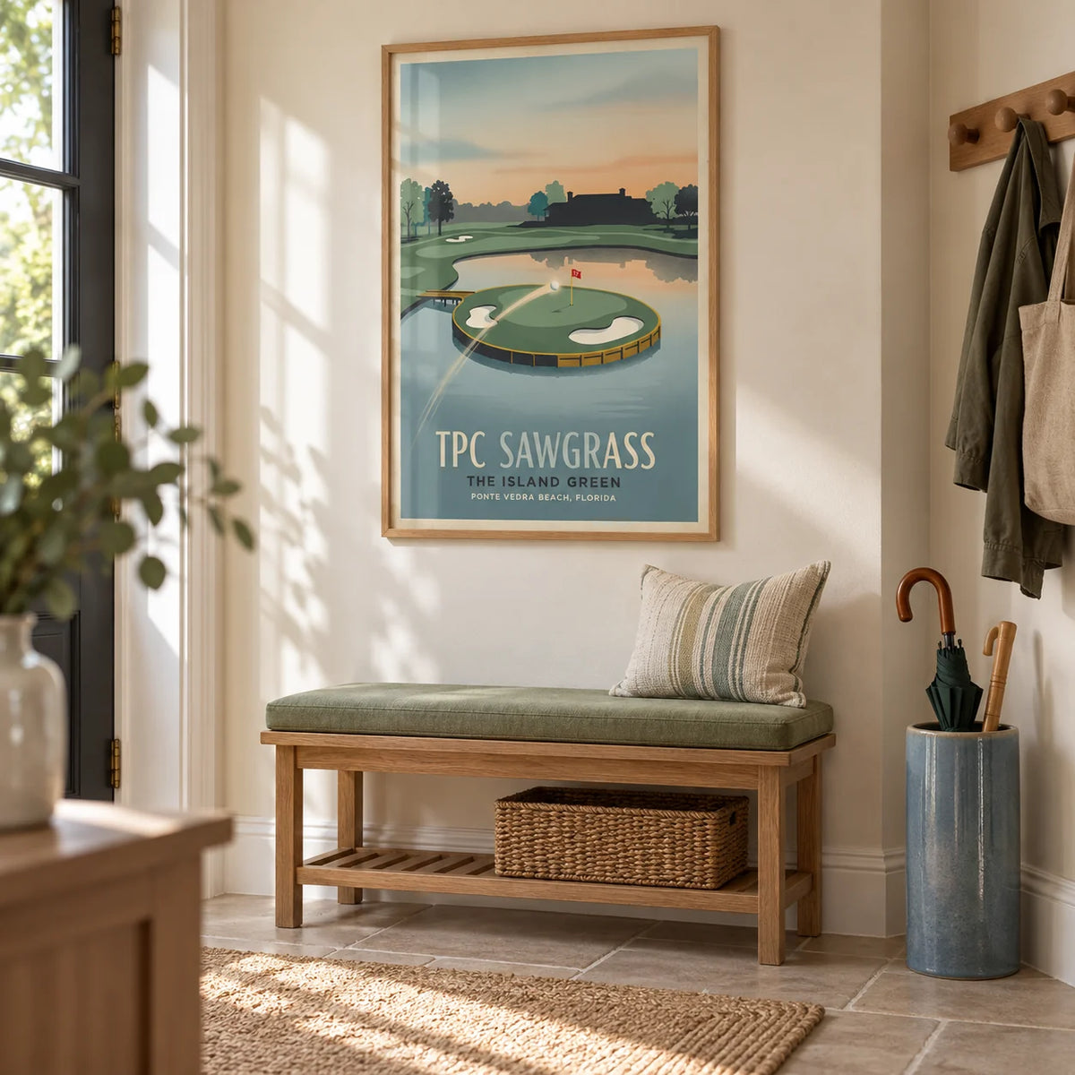 Island Green Golf Wall Art, framed on the wall of a bright entrance hallway in a UK suburban home with a soft cream wall and plain stone flooring