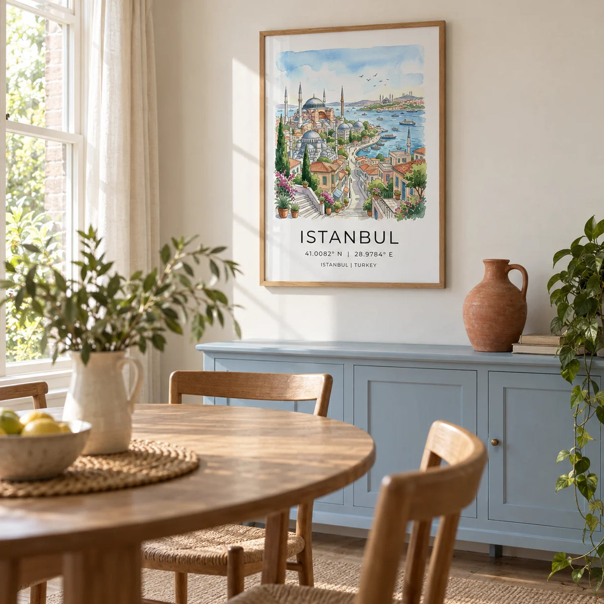 Istanbul Wall Art, framed on the wall of a light dining room in a UK garden flat with chalky cream walls and a pale blue painted sideboard