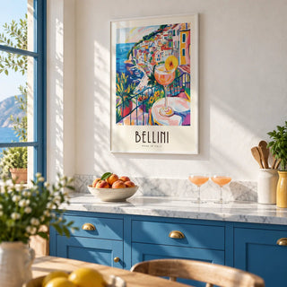 Italian Style Cocktail Wall Art, framed on the wall of a bright Italian kitchen with solid sea blue painted cabinets and white plaster walls