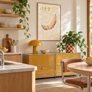 Japanese Banana Poster hung above a retro modular console in a playful kitchen (frame not included)