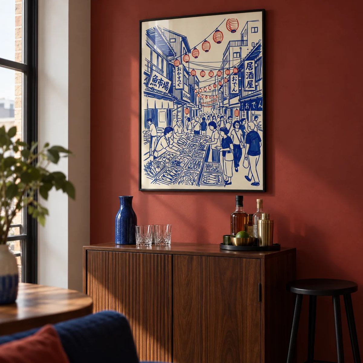 Japanese Street Market Art, framed on the wall of a compact home bar alcove in an urban UK living room with a muted red painted wall
