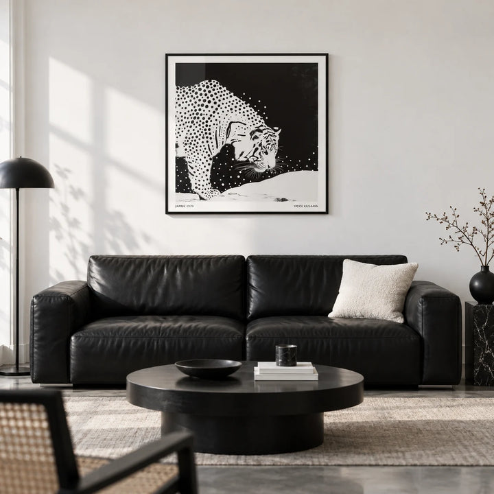 Japanese Tiger Art, framed on the wall of a design-led monochrome living room with a white wall and a polished concrete floor