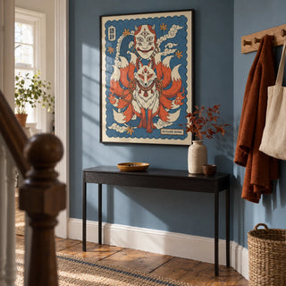 Kitsune Mask Art, framed on the wall of a characterful hallway in a renovated UK terraced house with muted blue walls and warm timber floorboards