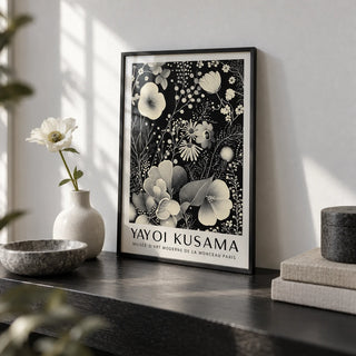 Large Floral Wall Art, a small A4 framed print leaning on a black shelf in a living room