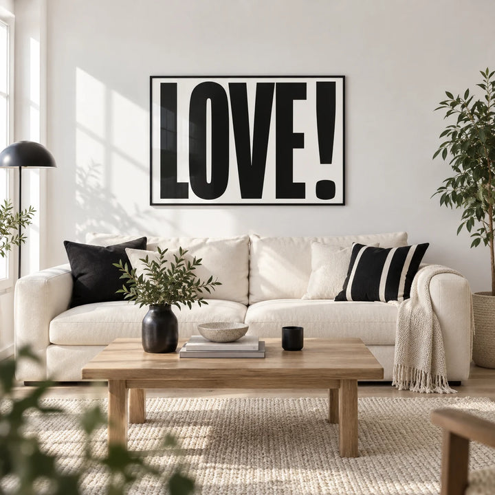Large Motivational Posters, framed on the wall of a bright modern living room with a white wall and a pale oak floor