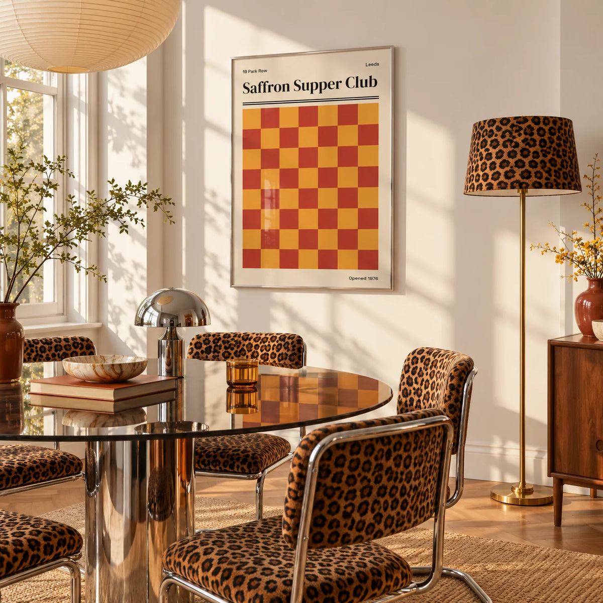 Leeds Print, framed on the wall of a bright white dining room in strong afternoon sun