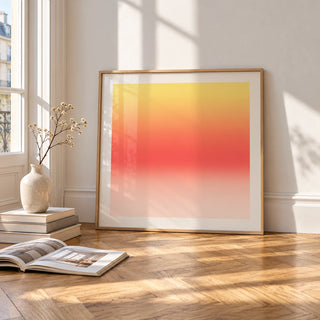 Lemon Sunset Print, framed and leaning on the parquet floor of a bright living room