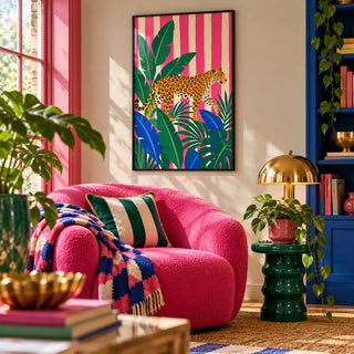 Leopard Prowl Poster, framed on the wall of a cosy maximalist reading nook in a living room