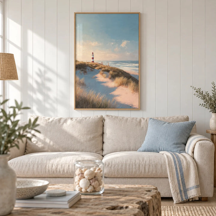 Lighthouse Wall Art, framed on the wall of a calm coastal living room with white painted tongue-and-groove walls and a pale oak floor