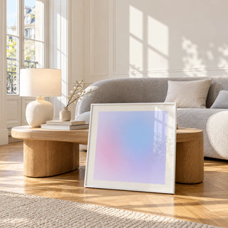 Lilac Haze Print, framed and leaning against a coffee table in a bright living room