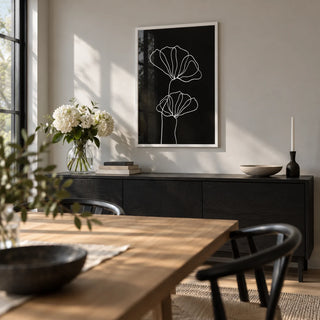 Line Art Floral Print, framed on the wall of a modern dining room with a pale grey wall