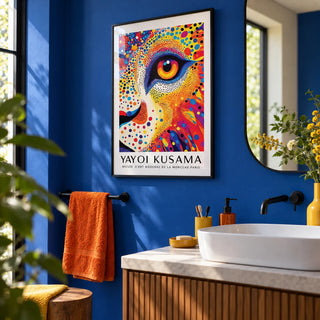 Lion Animal Poster, framed on the wall of a bold modern bathroom with a cobalt blue painted wall and a white basin
