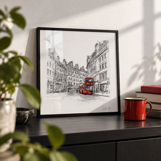 London England Wall Art, a small A4 framed print leaning on a black shelf in a living room