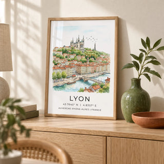 Lyon City Art Print, a small A4 framed print leaning on a pale oak sideboard in a living room