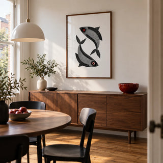 Madhubani Fish Wall Art, framed on the wall of a modern dining room in a UK terraced house with a soft white wall and warm timber flooring